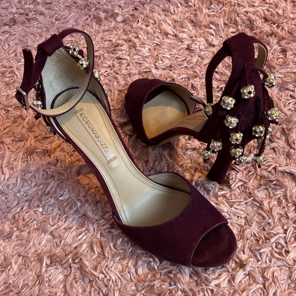 purple BCBG peep toe heels with decoration in the back